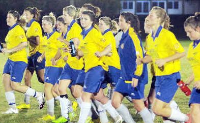 Members of the Gympie women’s Miners side do a victory lap after beating Maroochydore 2-0 last Friday night. The win has allowed Gympie to break free of Maroochydore to enjoy an exclusive lead on the competition ladder. Members of the Gympie women’s Miners side do a victory lap after beating Maroochydore 2-0 last Friday night. The win has allowed Gympie to break free of Maroochydore to enjoy an exclusive lead on the competition ladder.